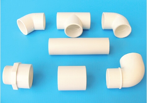 White fittings and PVC pressure tube